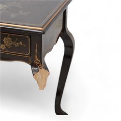 Chinese chinoiserie lacquered side table, fitted with two drawers, on cabriole supports, decorated with painted and gilt floral scenes