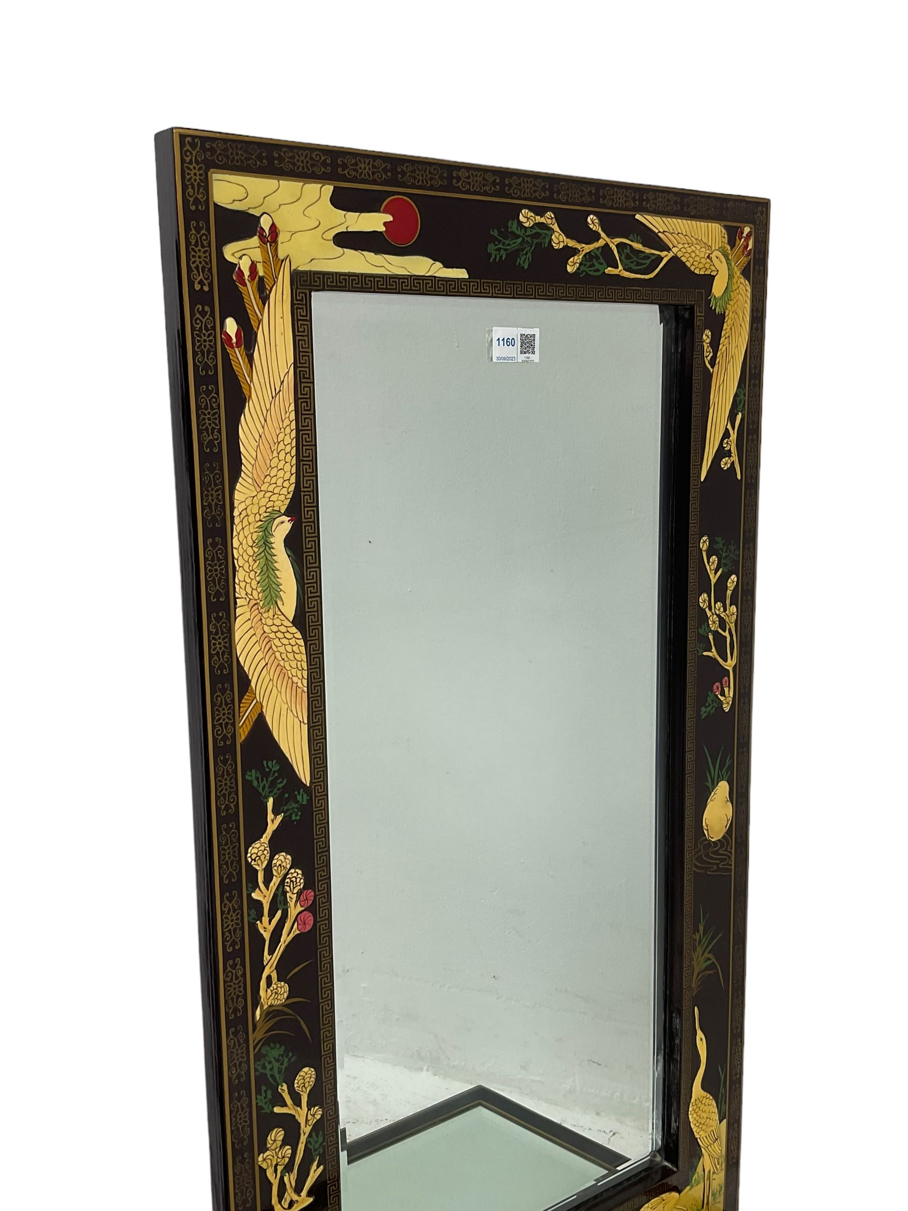 Chinoiserie design wall hanging mirror with shelf, the rectangular frame with raised decoration depicting birds and landscapes, fitted with bevelled glass 