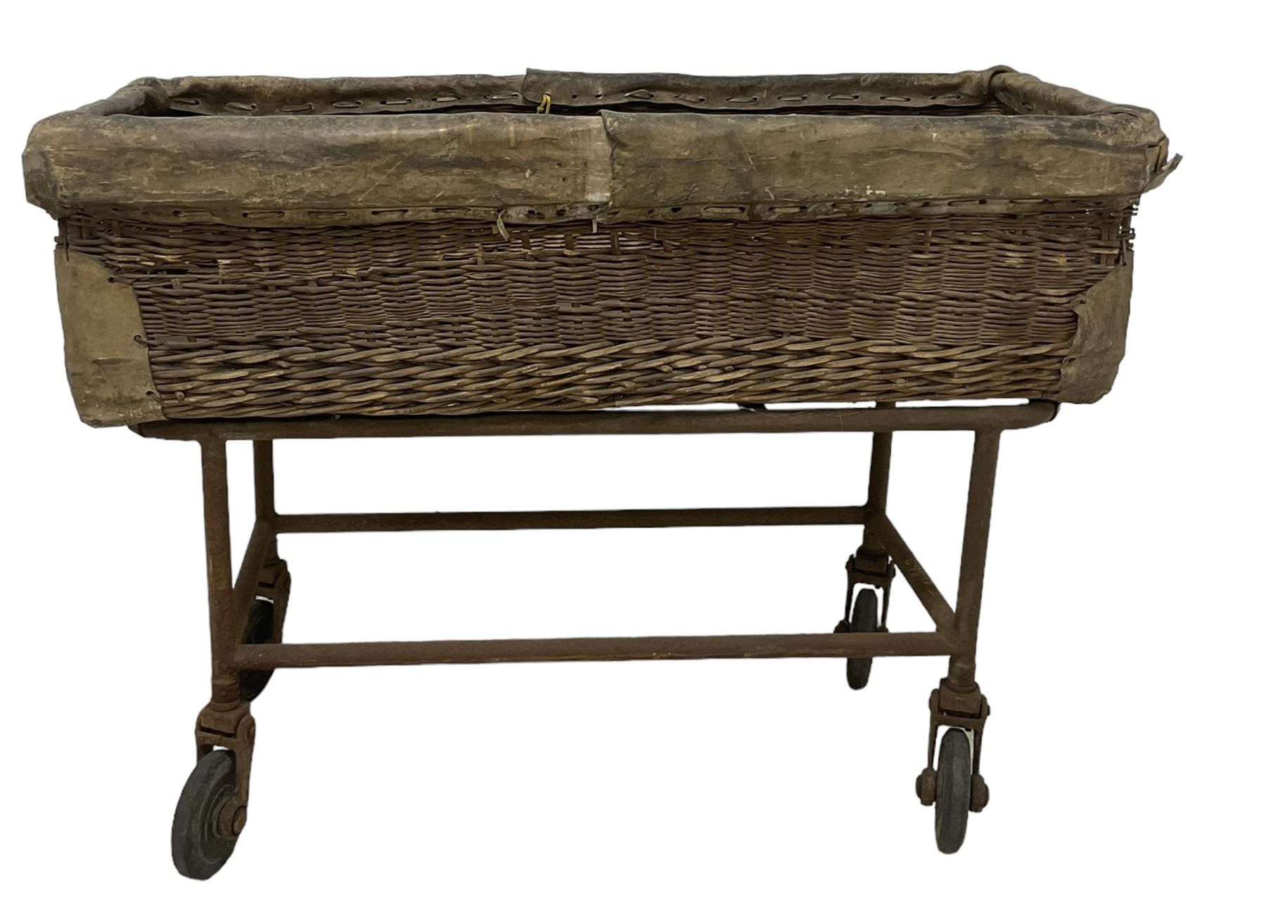 Early 20th century GPO wicker and hide bound postal trolley, on a cast iron base with castors