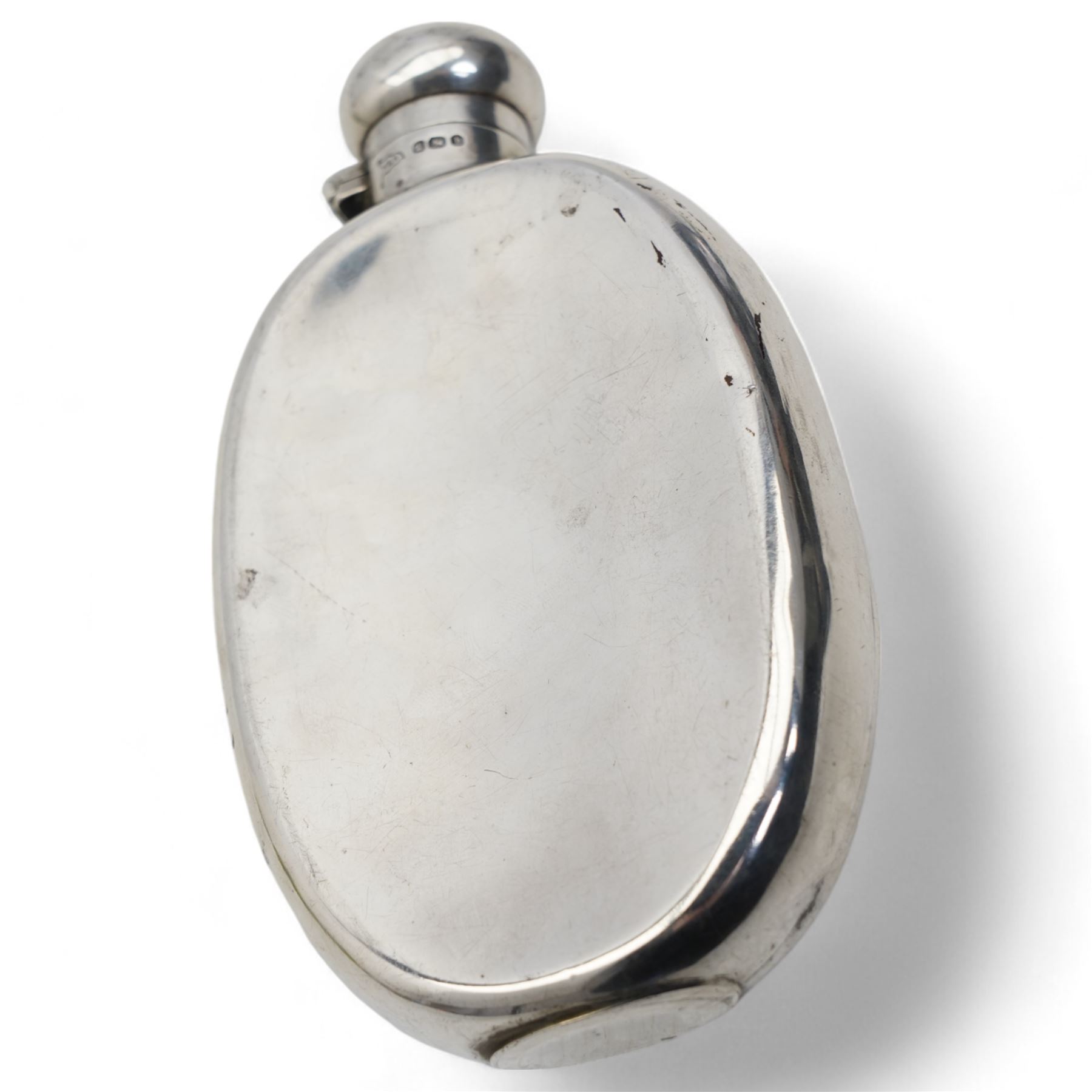 Late Victorian silver hip flask of flattened oval form L14cm Sheffield 1894 Maker Walker & Hall 