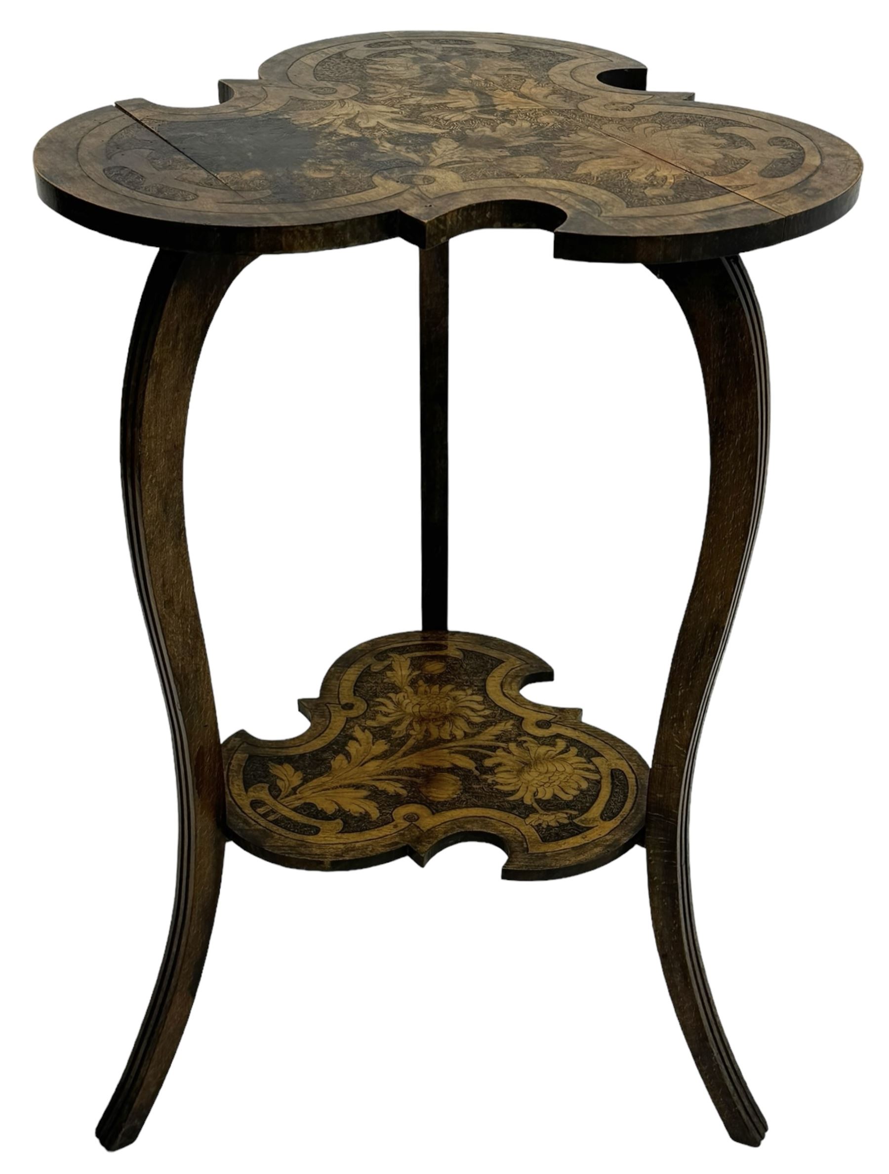 Late Victorian stained beech side table, trefoil clover-shaped top with floral pokerwork decoration, supported by curved fluted legs and united by undertier 