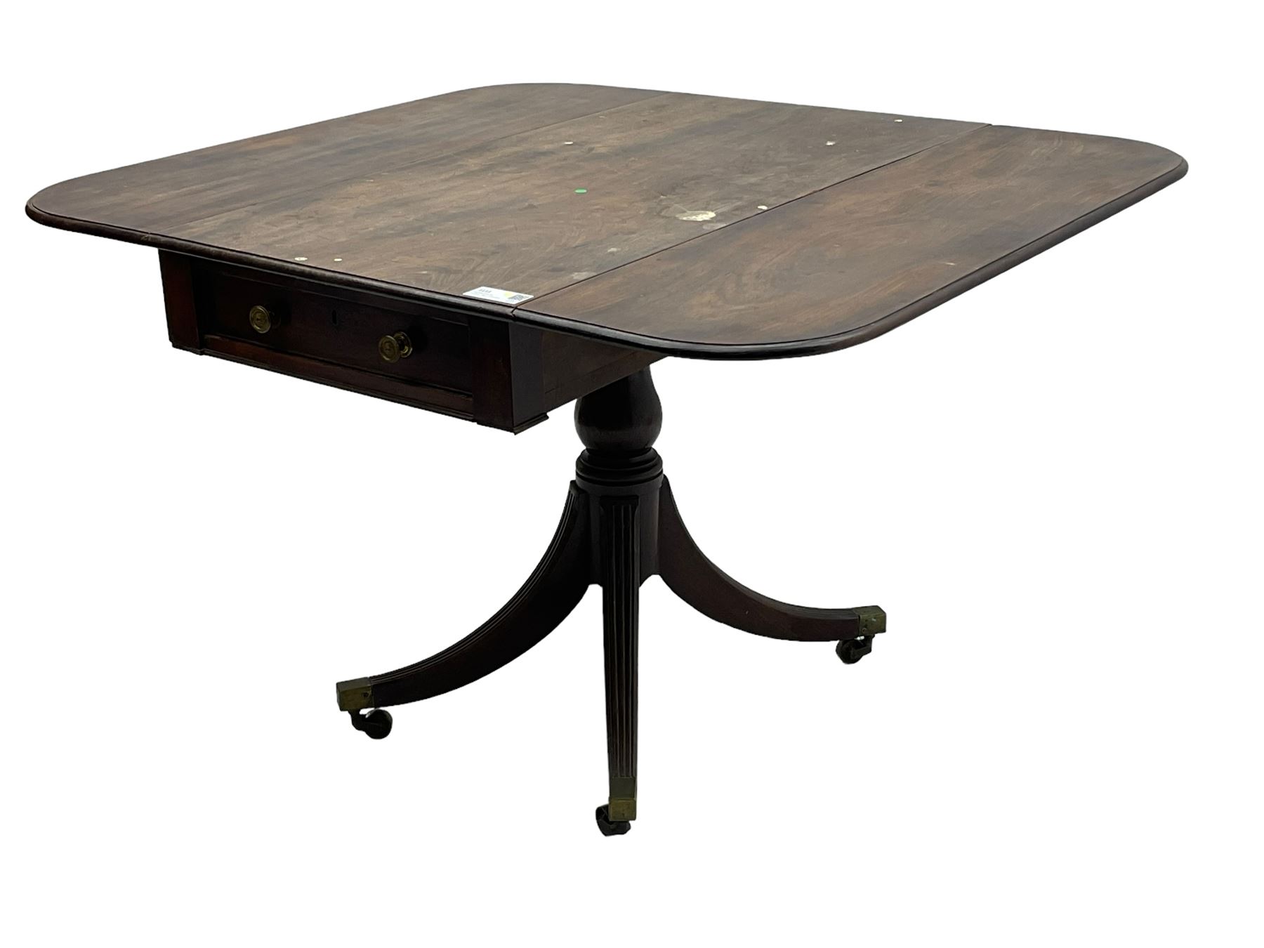 George III mahogany Pembroke table, moulded rectangular drop-leaf top with rounded corners, fitted with single cock-beaded end drawer, on turned pedestal with four reed moulded supports, brass cups and castors 