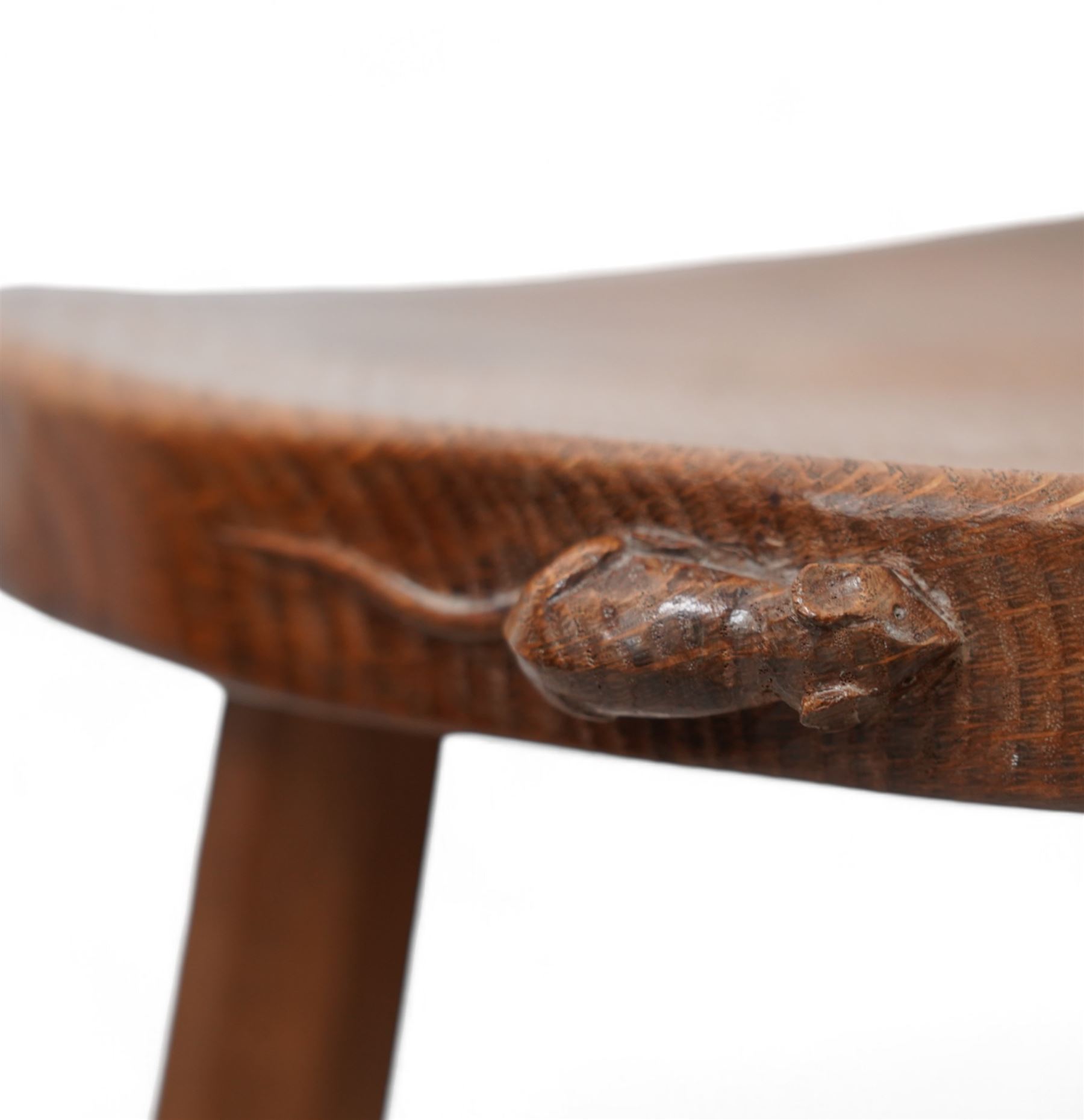 Mouseman - oak kidney-shaped stool, on three tapered octagonal supports, carved with moues signature, by the workshop of Robert Thompson, Kilburn 