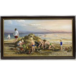 Glenys Bintley (Northern British 20th Century): Children Building a Sandcastle, oil on board signed, artists address label verso 34cm x 64cm