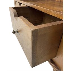 John Lewis - 'Bergerac' oak bookcase, projecting moulded cornice over four adjustable open shelves, two drawers to the base with cut-out handles, on square tapered supports