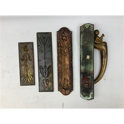 Art Nouveau bronze door handle modelled with a young merman holding a stylised fish, the plate decorated with geometric terminals, together with three repousse detail finger plates, largest L36cm