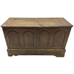 Georgian oak converted mule chest, rectangular plank top over two cupboards with arched Gothic motif panels enclosing storage area with shelves, the base with three drawers with pull handles, on shaped bracket feet