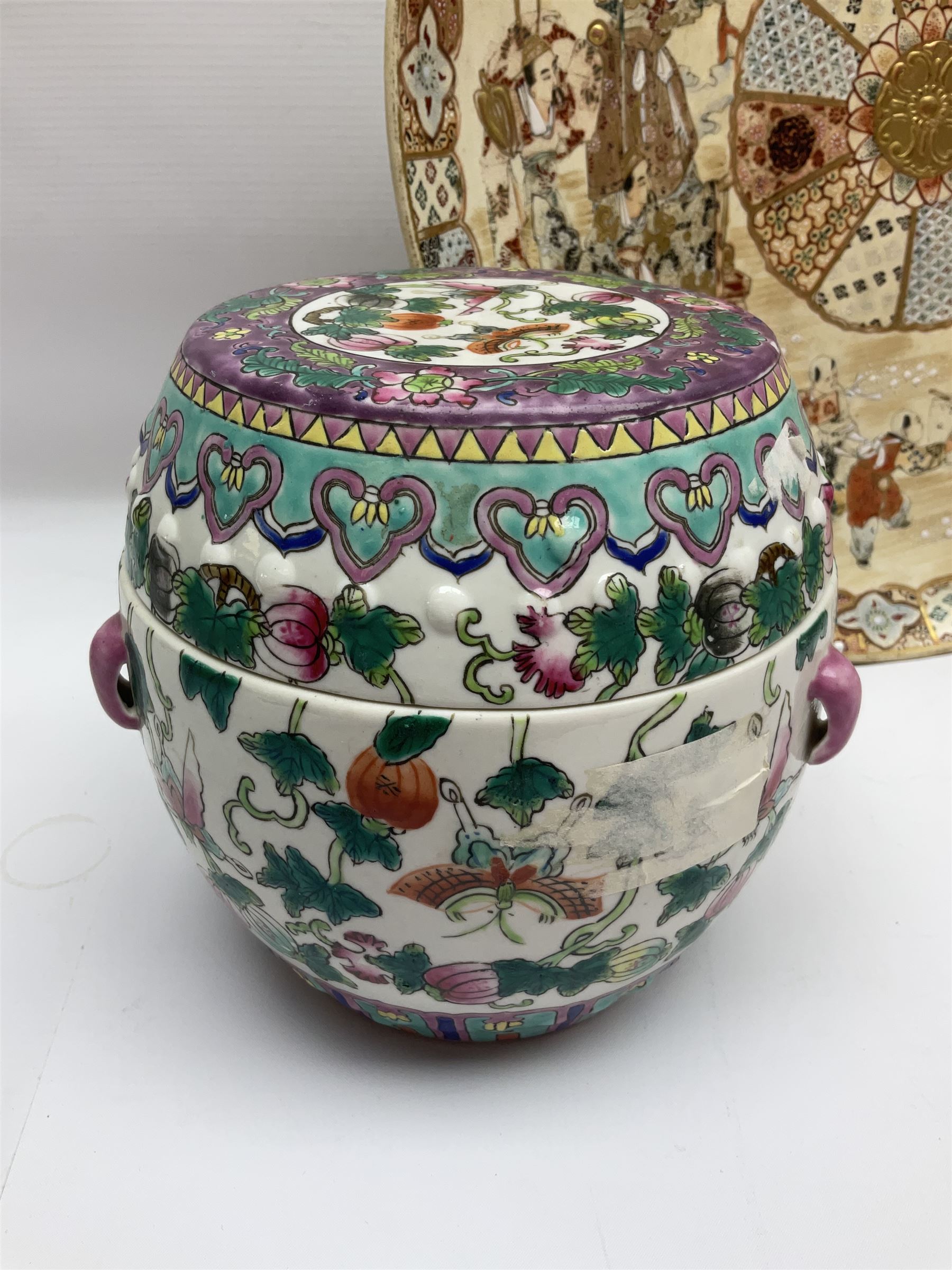 20th century Chinese famille rose jar, the body decorated in polychrome enamels with floral and foliate decoration on a white ground with a central figural panel and gilt key border to base, with six character mark beneath, H31cm, with later turned wooden cover, together with a similar footed bowl and jar,  jar cover with temple dog finial and a large Japanese Satsuma charger