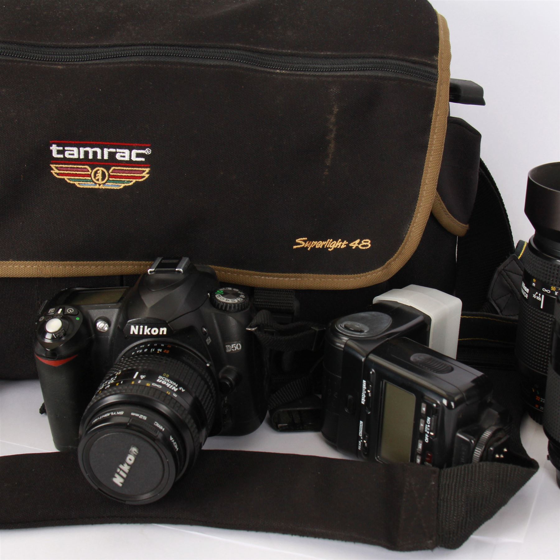 Nikon D50 camera body, serial no. 6031900, together with four Nikon AF Nikkor Hoya Skylight lenses, carrycase and other accessories