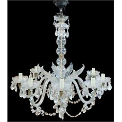 Italian style eight branch glass chandelier, with baluster stem, eight barley twist scroll arms interspersed by seven clear blown glass leaves, petal edged drip pans and hung with faceted glass bead swags and drops, H94cm x W85cm approx.