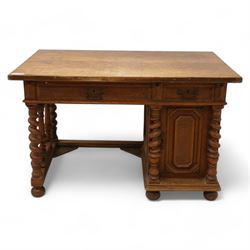 19th century oak desk, rectangular top over two drawers and cupboard, on spiral turned supports and turned bun feet