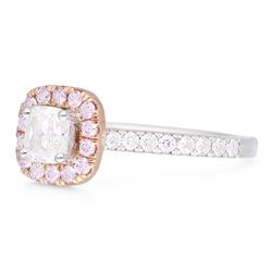 Platinum and 18ct rose gold diamond halo cluster ring, the principal white cushion cut diamond of 0.51 carat, with GIA report, colour G, clarity VS2, with round brilliant cut pink diamond surround of approx 0.20 carat, and white diamond set shoulders, hallmarked