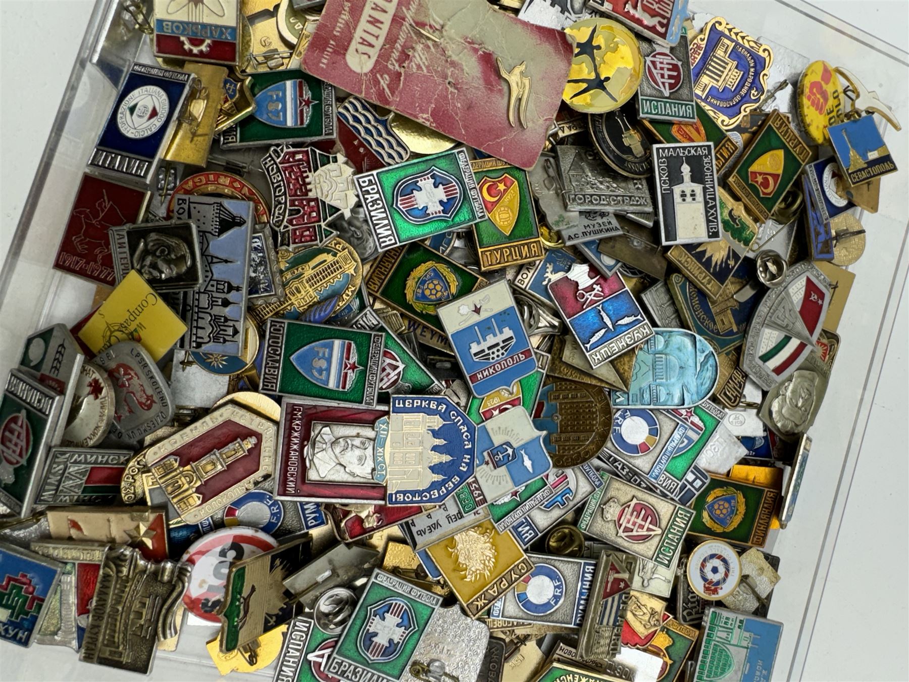 Collection of enamel badges and similar, predominantly Russian examples