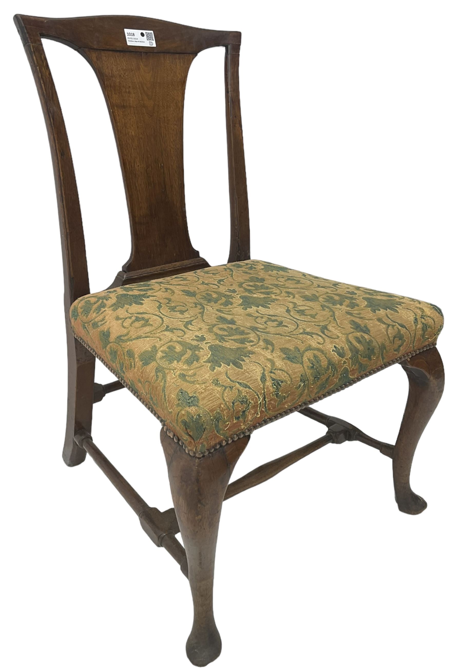 Mid-18th century mahogany side chair, shaped cresting rail over tapered back splat, seat upholstered in green and camel foliate patterned fabric with stud work border, raised on cabriole supports united by swell-turned stretchers