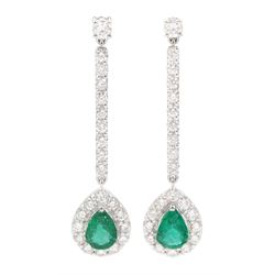 Pair of 18ct white gold pear cut emerald and round brilliant cut ...