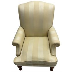 Wesley-Barrell - Georgian design traditional shaped armchair with rolled arms, sprung back and loose seat cushion upholstered in beige striped fabric with gold piping, raised on cabriole supports with ball and claw feet