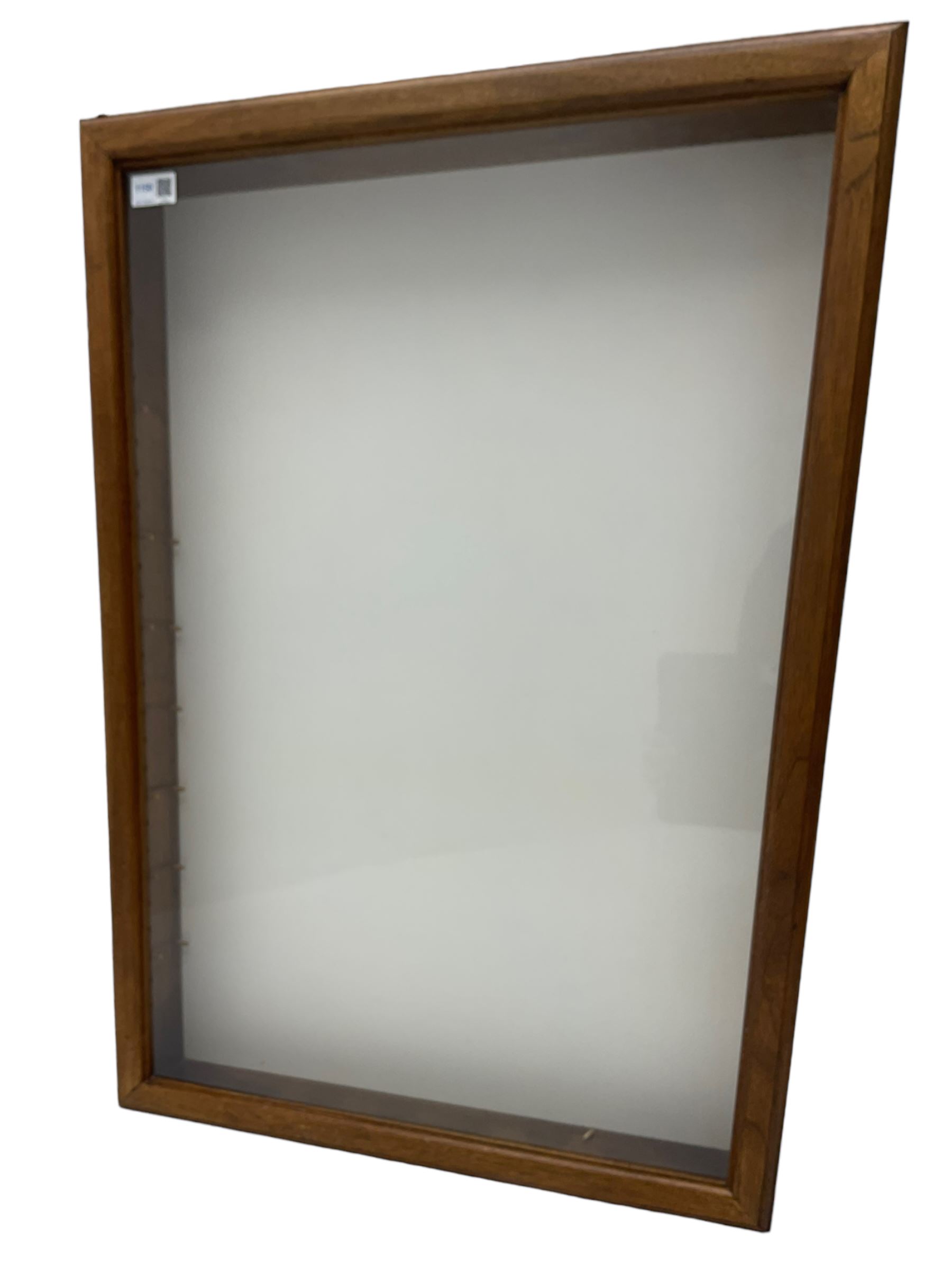 Walnut wall hanging display cabinet cabinet, enclosed by glazed door in moulded frame, fitted with glass shelves