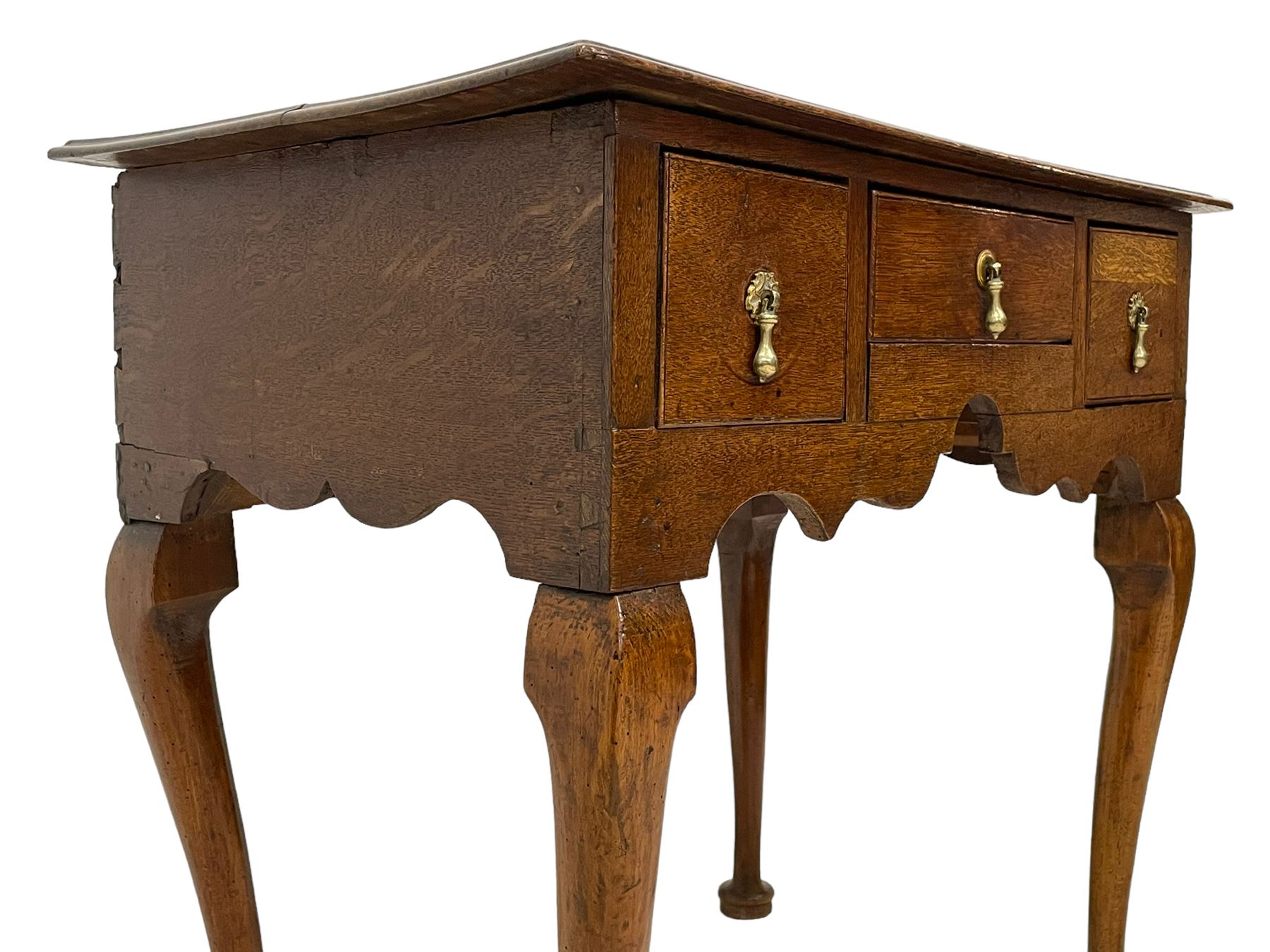 18th century oak low-boy, rectangular moulded top over three drawers with scratch mouldings, shaped apron, on cabriole supports