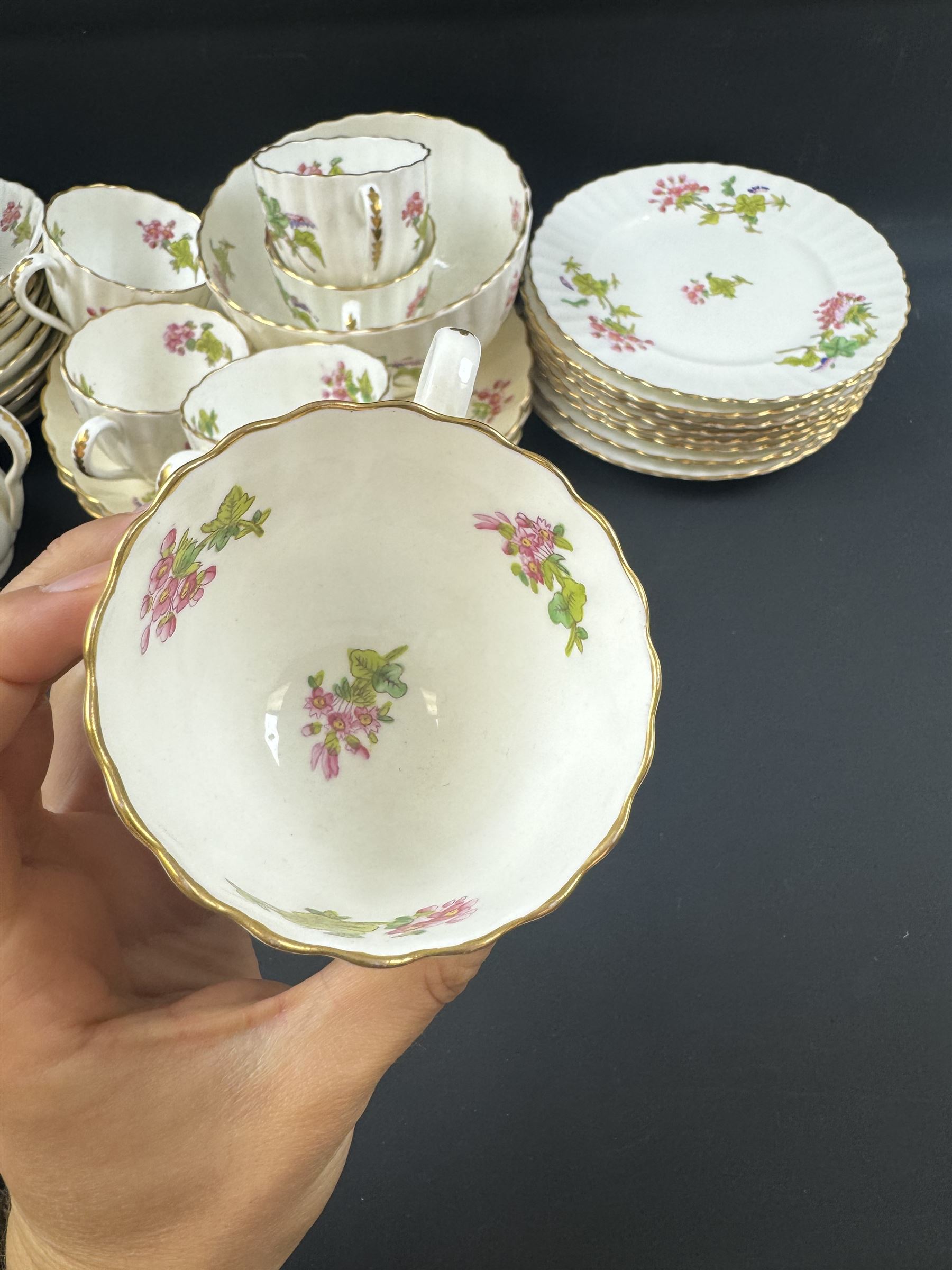 Coalport part tea service, decorated with floral sprigs, including eight cups and saucers, milk jug, eight dessert plates etc  