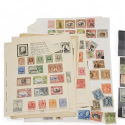 World stamps on album pages and stockcards, including King George V Nigeria with higher values, Western Australia, Pitcairn Islands, St Helena, Zanzibar, Aden, Gibraltar, Canada, United States of America, Cayman Islands, Grenada etc