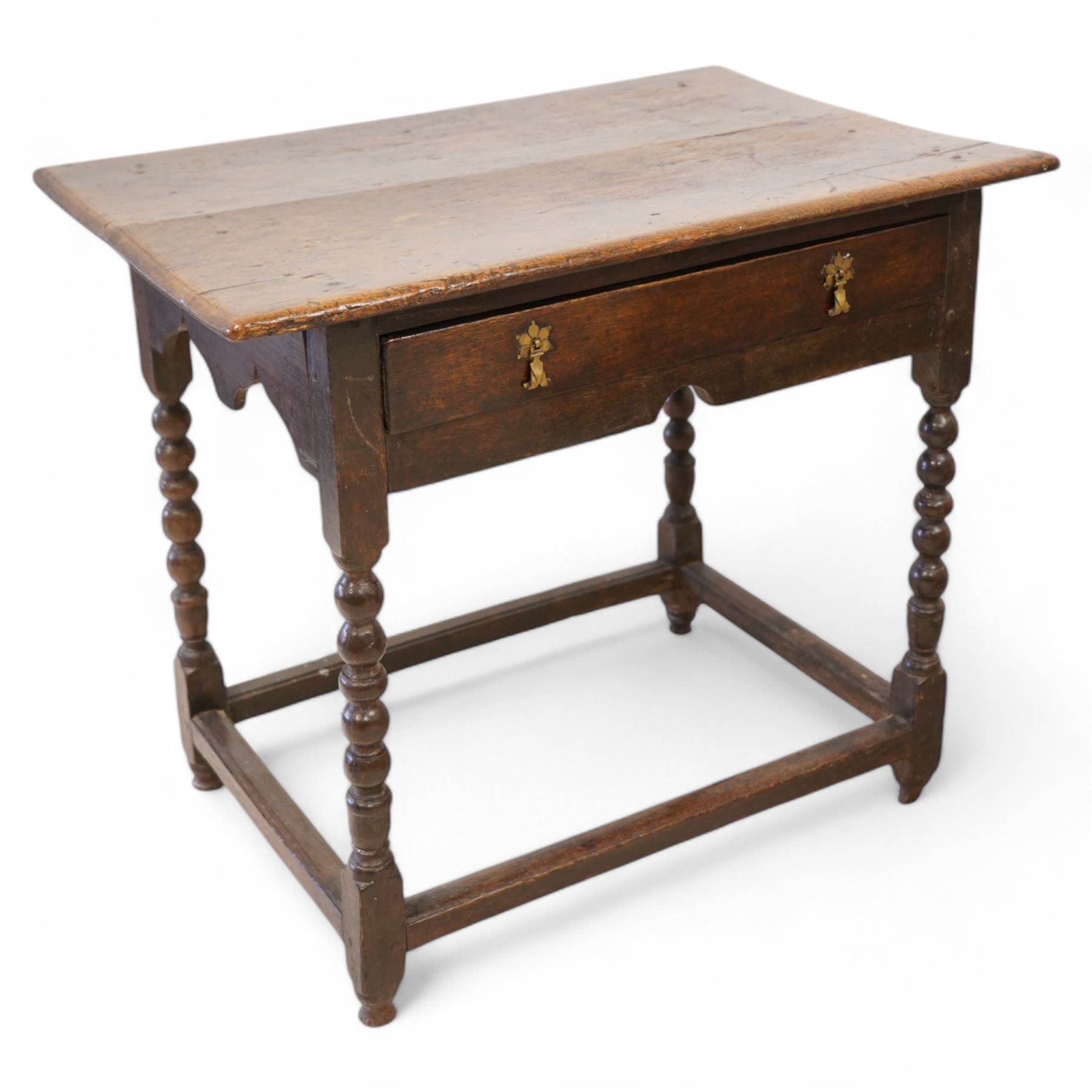 17th century oak side table, two plank rectangular top over single drawer, on bobbin-turned supports united by stretchers 