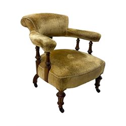 Victorian pair of mahogany armchairs, upholstered in gold velvet fabric, each with curved back, pierced splat and scroll arms, one with rounded seat and the other square, on turned front supports with castors