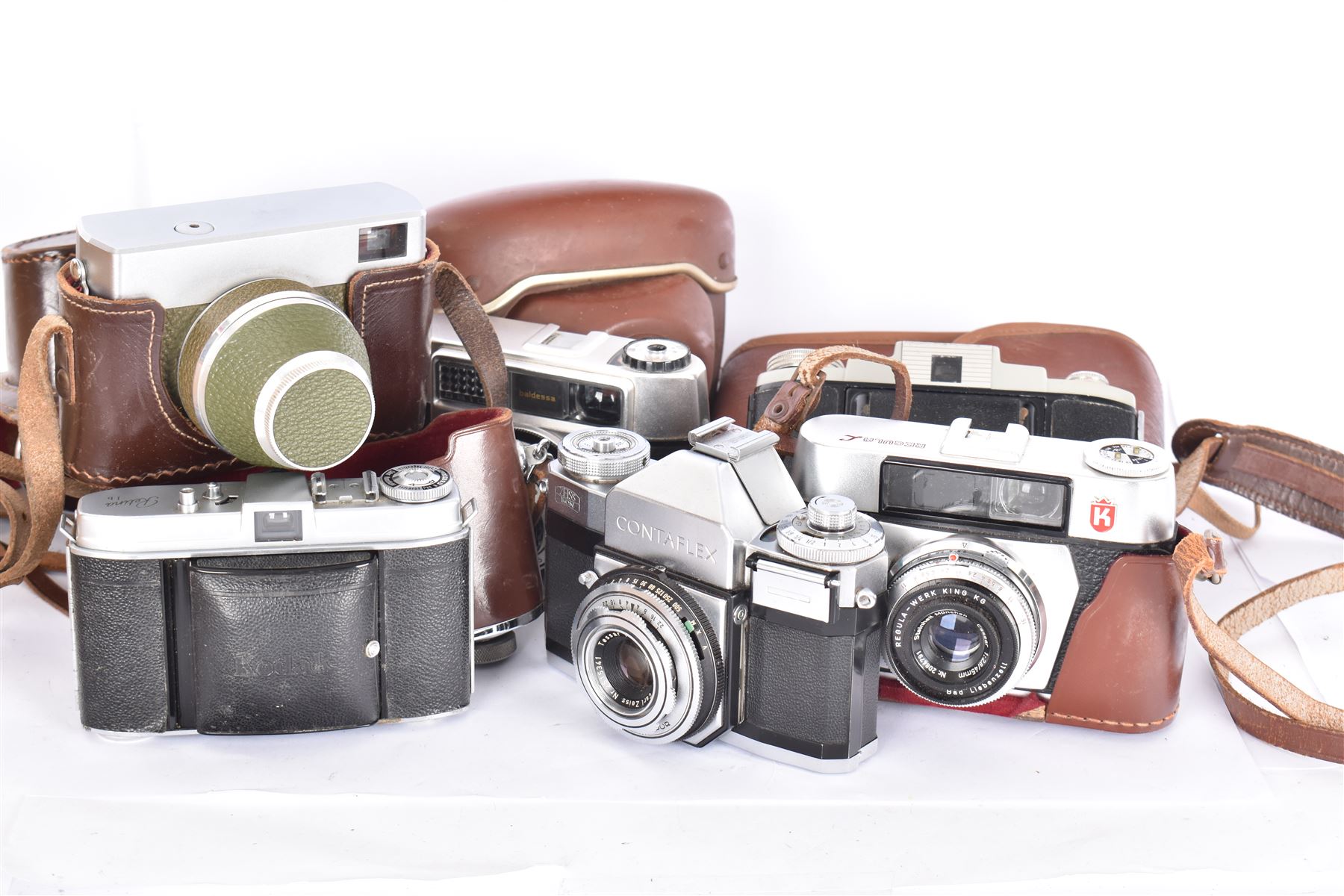 Collection of 35mm rangefinder cameras and similar, to include King Regula L, Balda Baldessa serial no. 370514, Synchro Compur MX V, Kodak Retina Ib serial no. 179811, Kodak 66 Model II and a Zeiss Ikon Contaflex, all with brown cases, with two leather camera bags and accessories