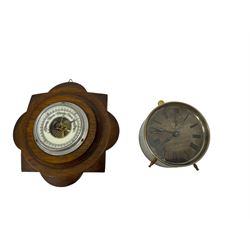 19th century American alarm clock and a 20th century wall hanging aneroid barometer