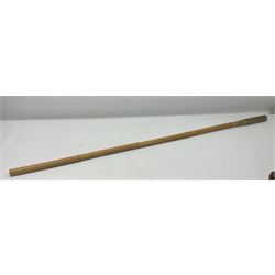 Bamboo cane torch, the pierced brass cover opening to reveal a wick, H144cm