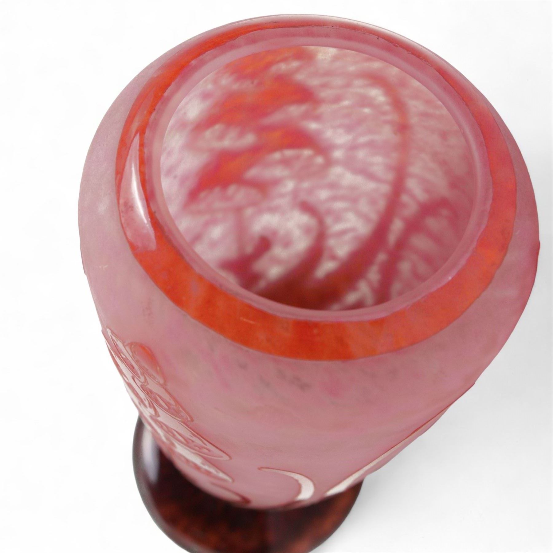 Le Verre Français, overlaid and etched cameo glass vase, circa 1920, internally mottled with pink and overlaid in amethyst with stylized floral decoration, the pedestal foot signed Le Verre Français, H26cm x D10.5cm 