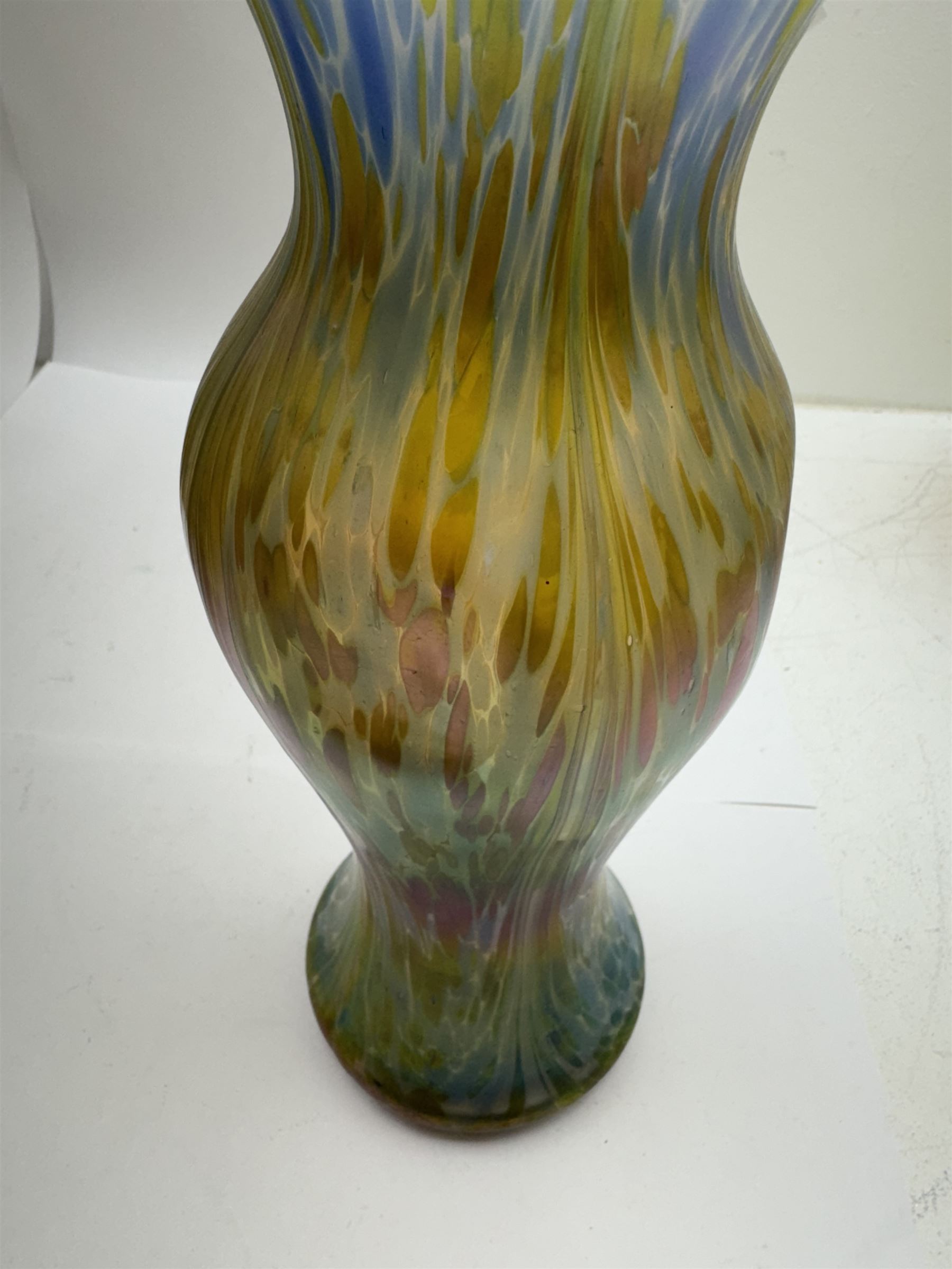 Austrian Art Nouveau iridescent glass vase, in the manner of Loetz, of baluster form with dimpled body, the pale blue glass with colourful iridescence throughout, H28cm