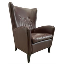 Wing back armchair upholstered in cocoa brown leather