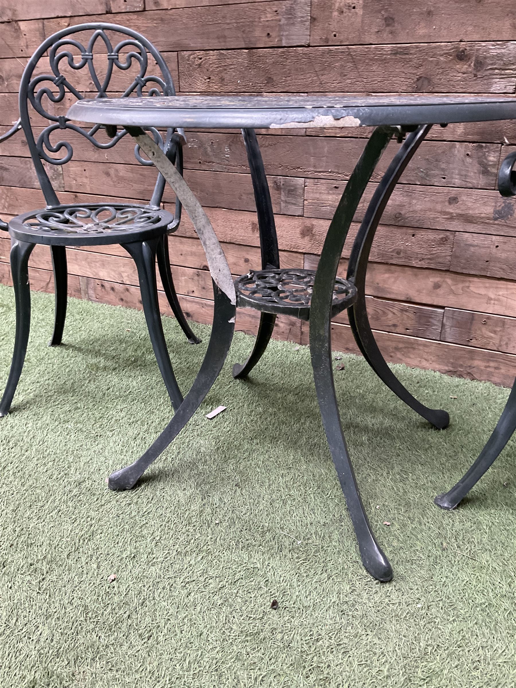 Green painted aluminium circular garden table and two chairs - THIS LOT IS TO BE COLLECTED BY APPOINTMENT FROM DUGGLEBY STORAGE, GREAT HILL, EASTFIELD, SCARBOROUGH, YO11 3TX