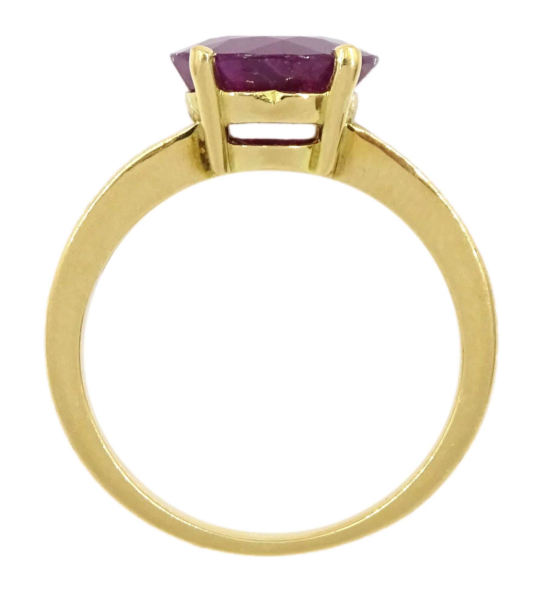 18ct gold single stone ruby ring, with channel set baguette cut diamond shoulders, ruby approx 3.25 carat, total diamond weight approx 0.85 carat