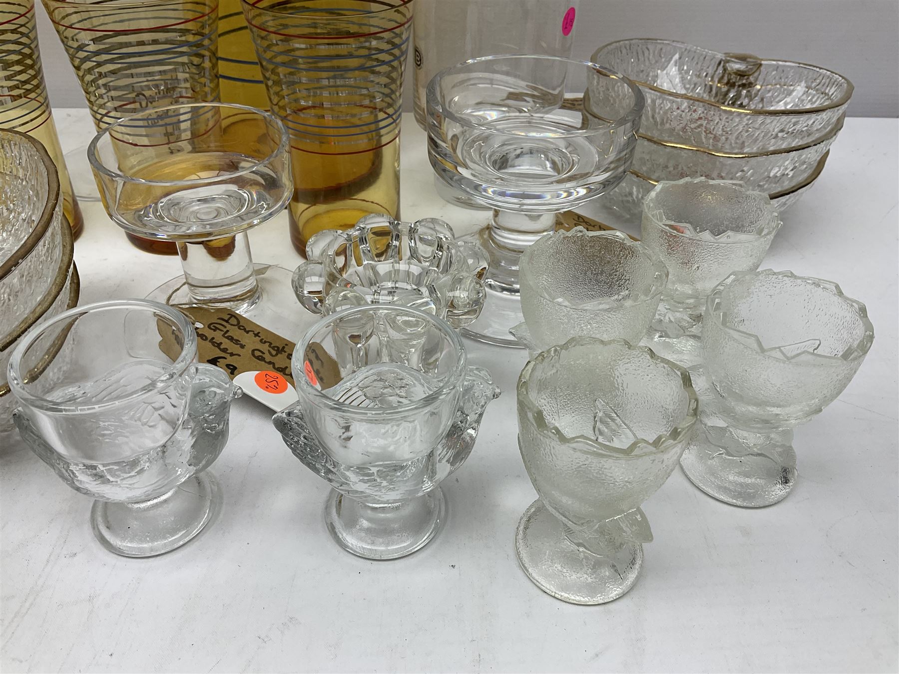 Amber glass lemonade pitcher with four glasses, together with apple shaped bowls and other glassware 