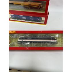 Four Hornby '00' gauge diesel locomotives, and R3786 Class 66 Co-Co Lest We Forget no. 66413, Class 90 Bo-Bo Intercity no. 90001,  R2482 Class 90 Freightliner no. 90041 and R3881 Class 66 Co-Co GBRf Andrew Scott CBE no. 66727, boxed