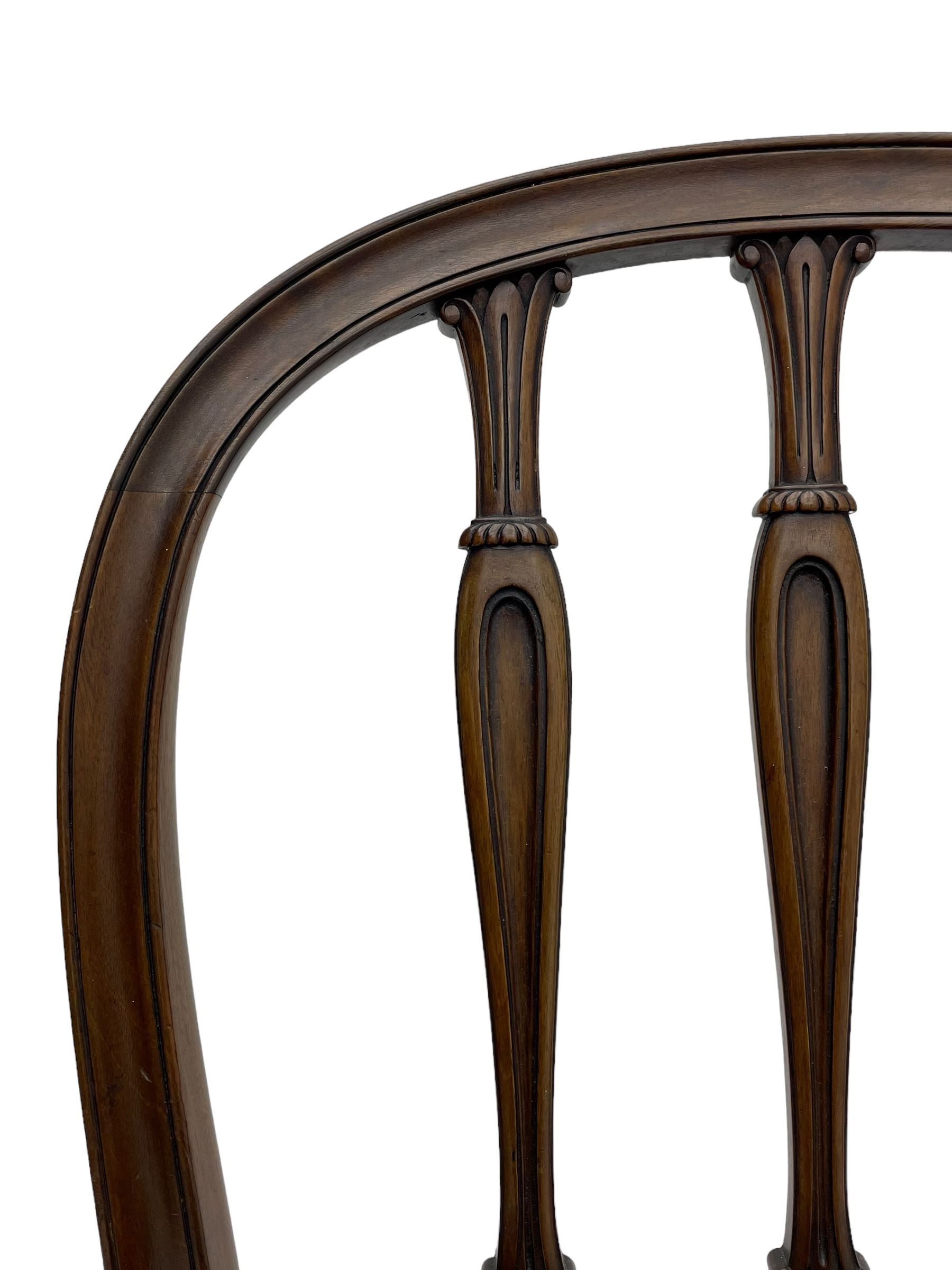 Set of six early 20th century Hepplewhite design mahogany dining chairs, moulded arched frame back, three shaped vertical rails carved with stylised foliate decoration, drop-in seats upholstered in brown fabric within moulded seat rails, on acanthus leaf carved cabriole supports with paw carved terminals 