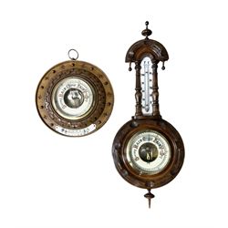 German- Late 19th century aneroid Barometer in a carved mahogany case with pendants and fi...