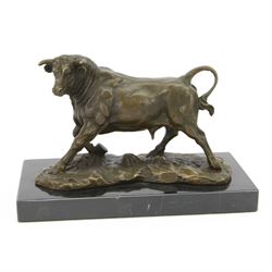 Bronze figure, modelled as a prancing bull, signed Milo, upon a marble rectangle base, H13cm 