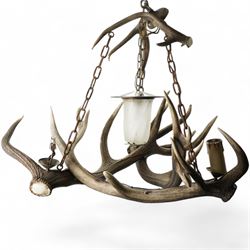 Deer antler chandelier, of triangular form, with four fitted lights H76cm