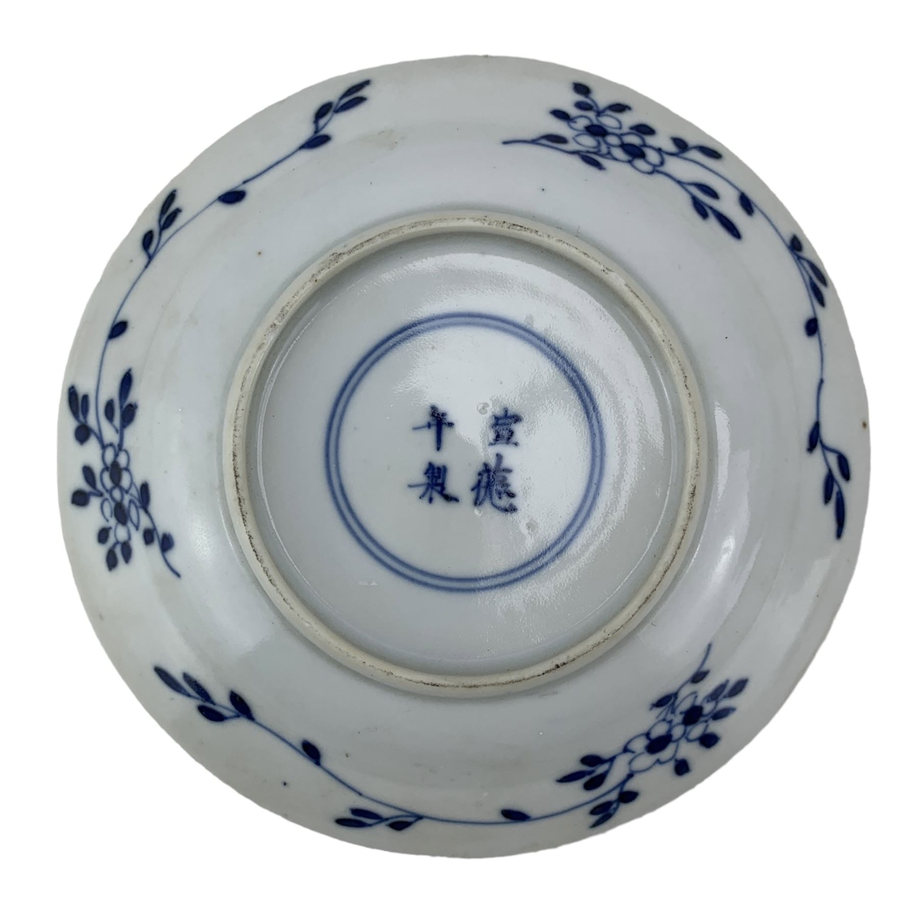 19th century Chinese blue and white saucer dish decorated in the Long Eliza pattern, four character mark within double circle beneath, D13.5cm, and a Chinese shaped dish painted with lotus flowers, provincial shop mark within square border beneath (2)