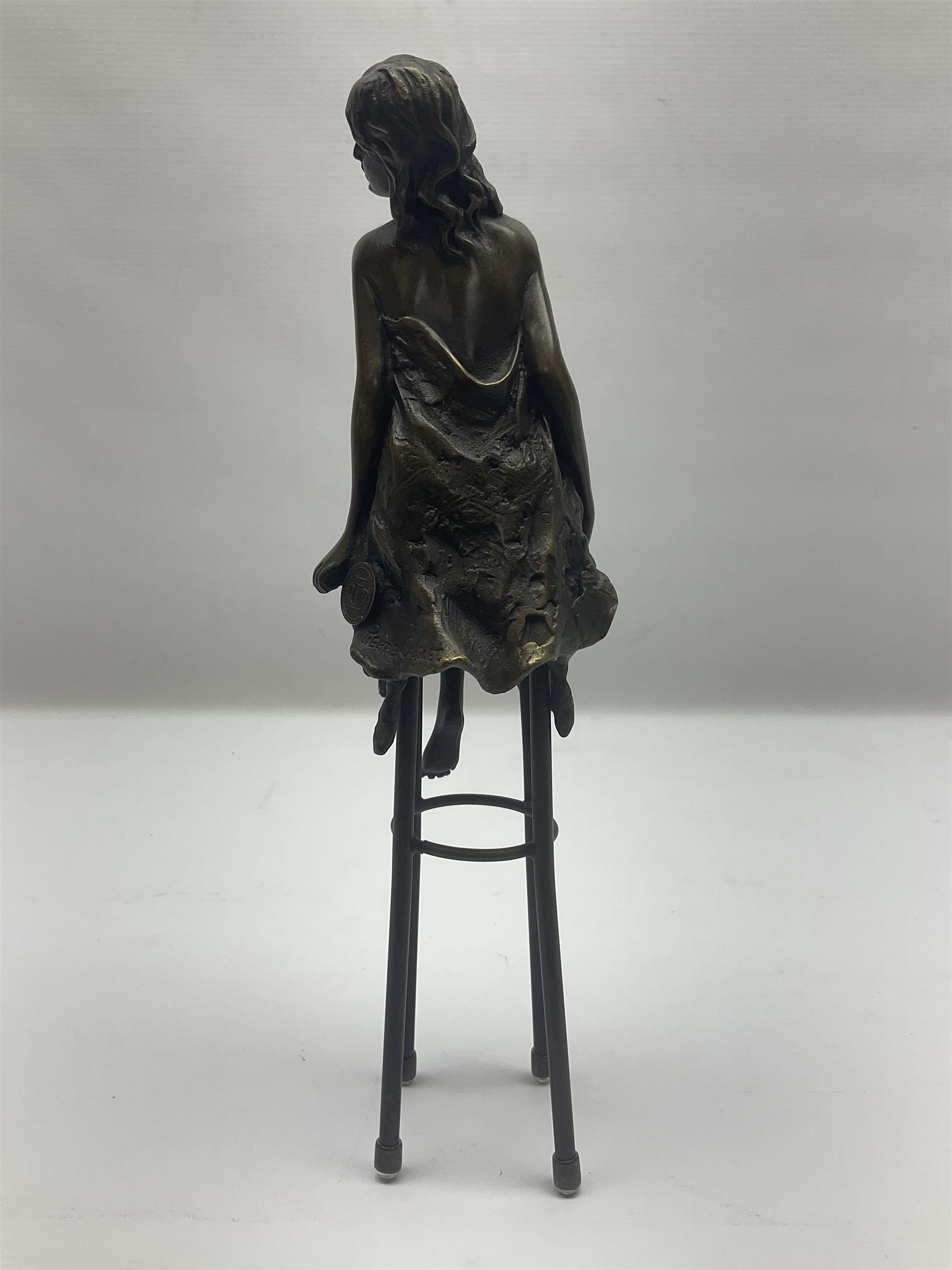 Art Deco style bronze modelled as a semi naked female figure, seated upon a chair, after 'Pierre Collinet', H27cm