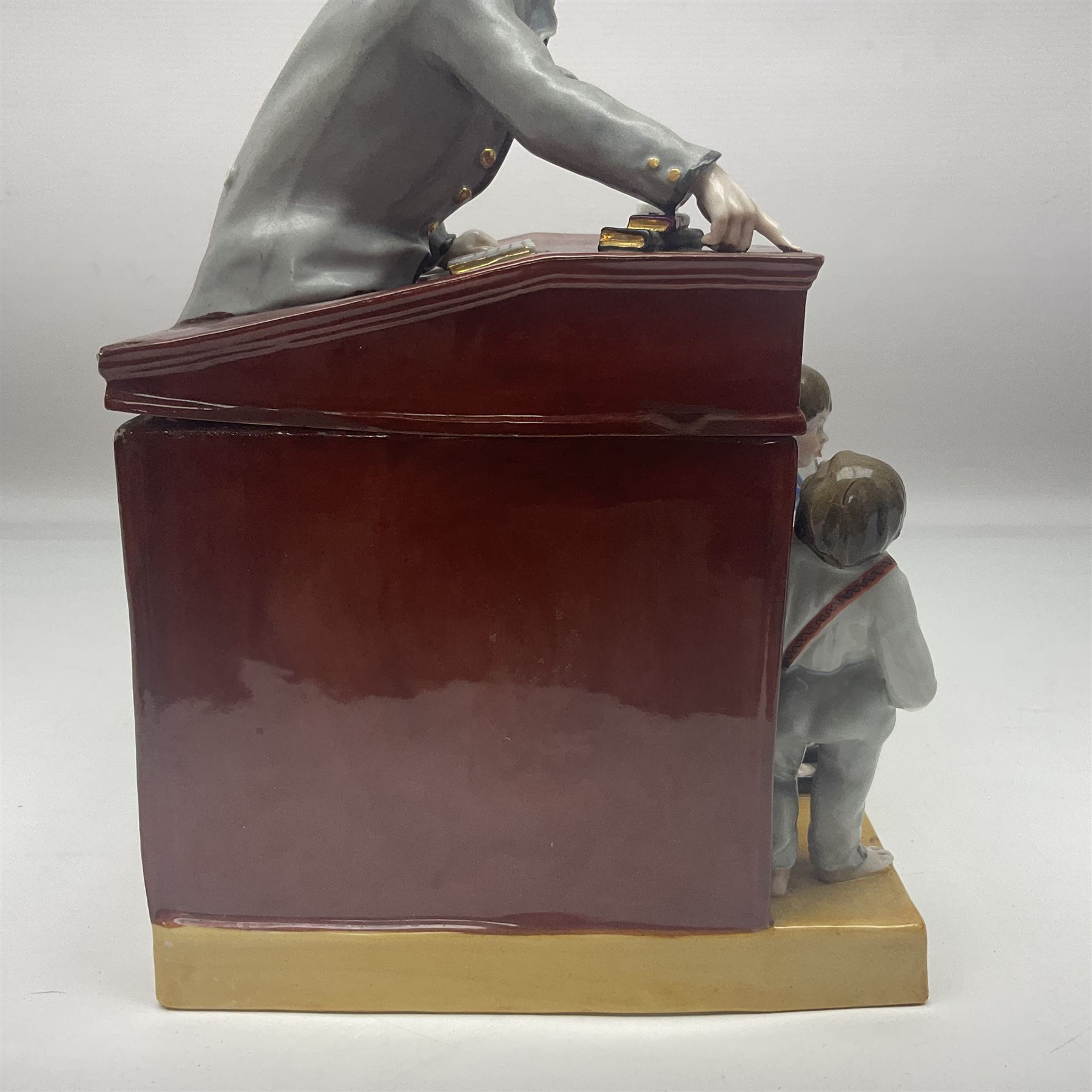 19th century Continental jar and cover, modelled as a classroom, with the teachers desk as the cover, H27cm