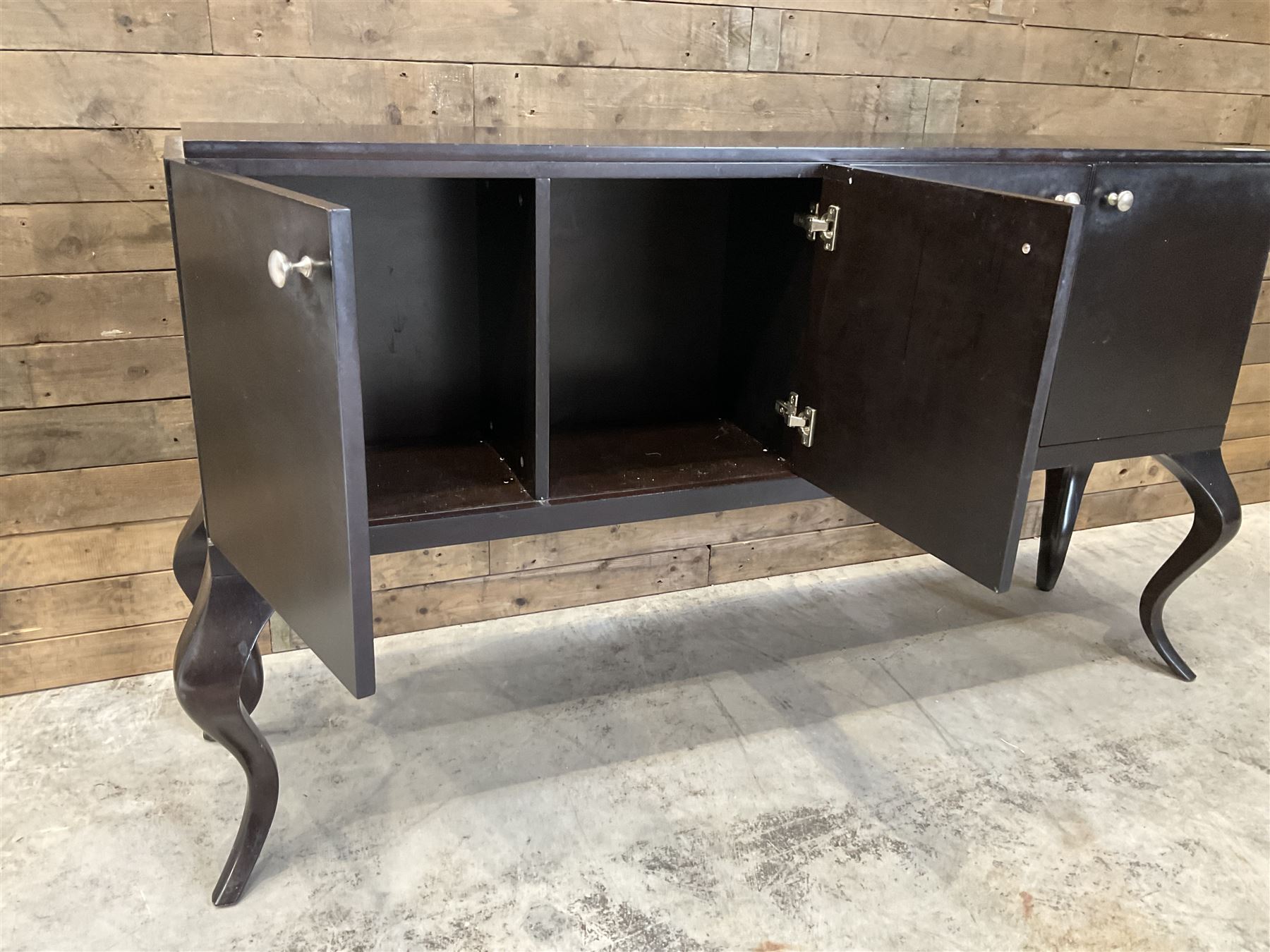 Rosewood finish four door sideboard, on cabriole legs