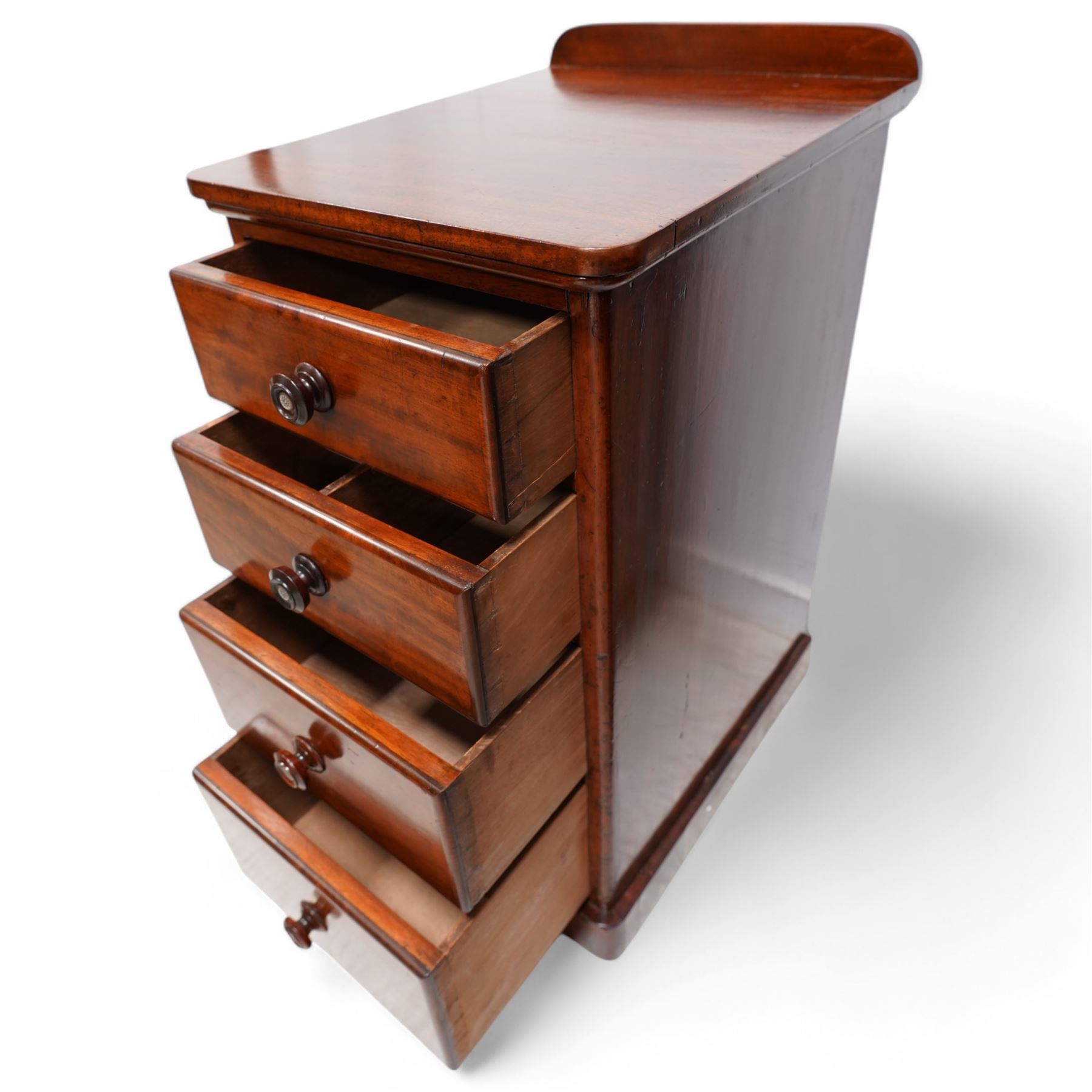 Pair of Victorian mahogany bedside pedestal chests, raised back over rectangular top with rounded front corners, fitted with four graduating drawers, on plinth base 