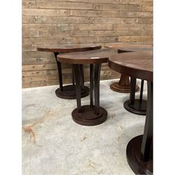 Circular walnut occasional table and four other circular tables