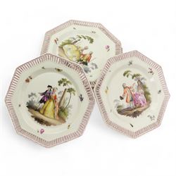 Set of six 19th century Berlin octagonal plates and a pair of two handled baskets, with pierced designs and decorated with couples in landscapes, plates D21cm, baskets, D23cm (8)