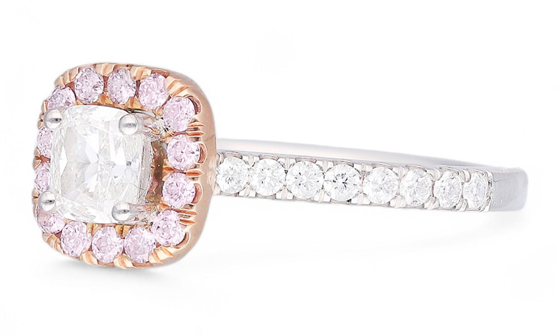 Platinum and 18ct rose gold diamond halo cluster ring, the principal white cushion cut diamond of 0.51 carat, with GIA report, colour G, clarity VS2, with round brilliant cut pink diamond surround of approx 0.20 carat, and white diamond set shoulders, hallmarked