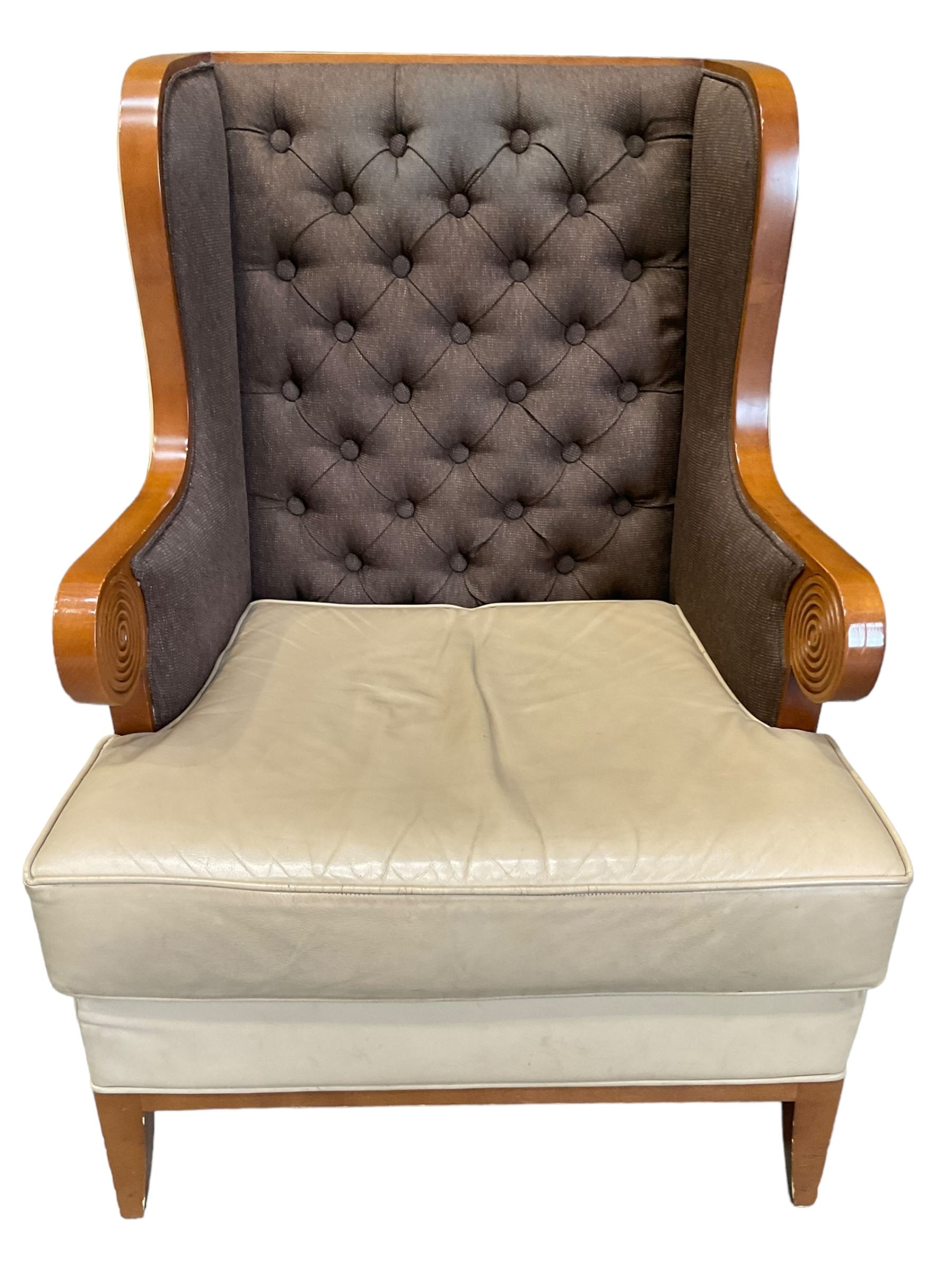 Walnut finish framed wing back armchair upholstered leather and buttoned fabric