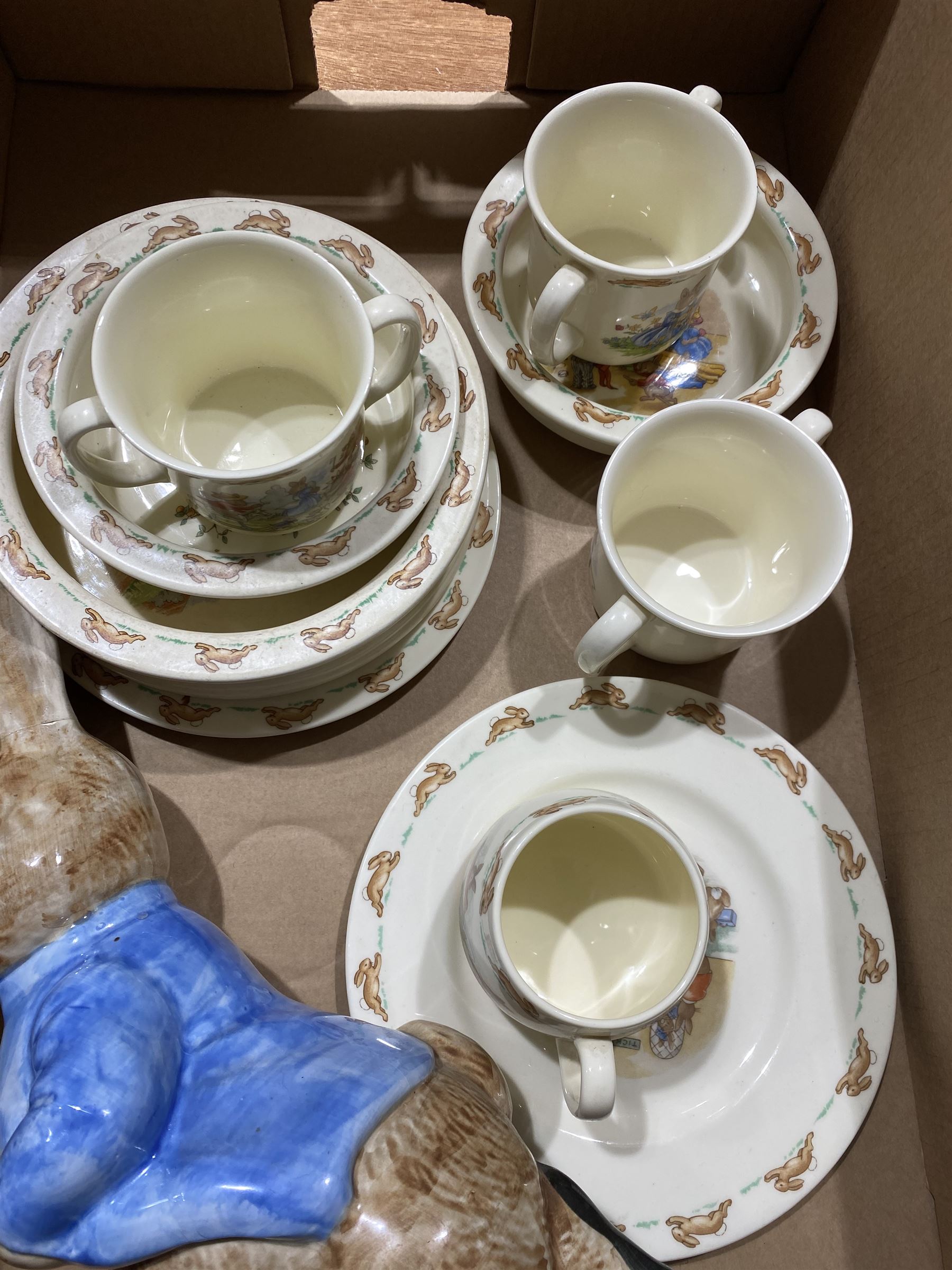 Collection of Royal Doulton Bunnykins nursery ware, together with a Sylvac Peter Rabbit figure